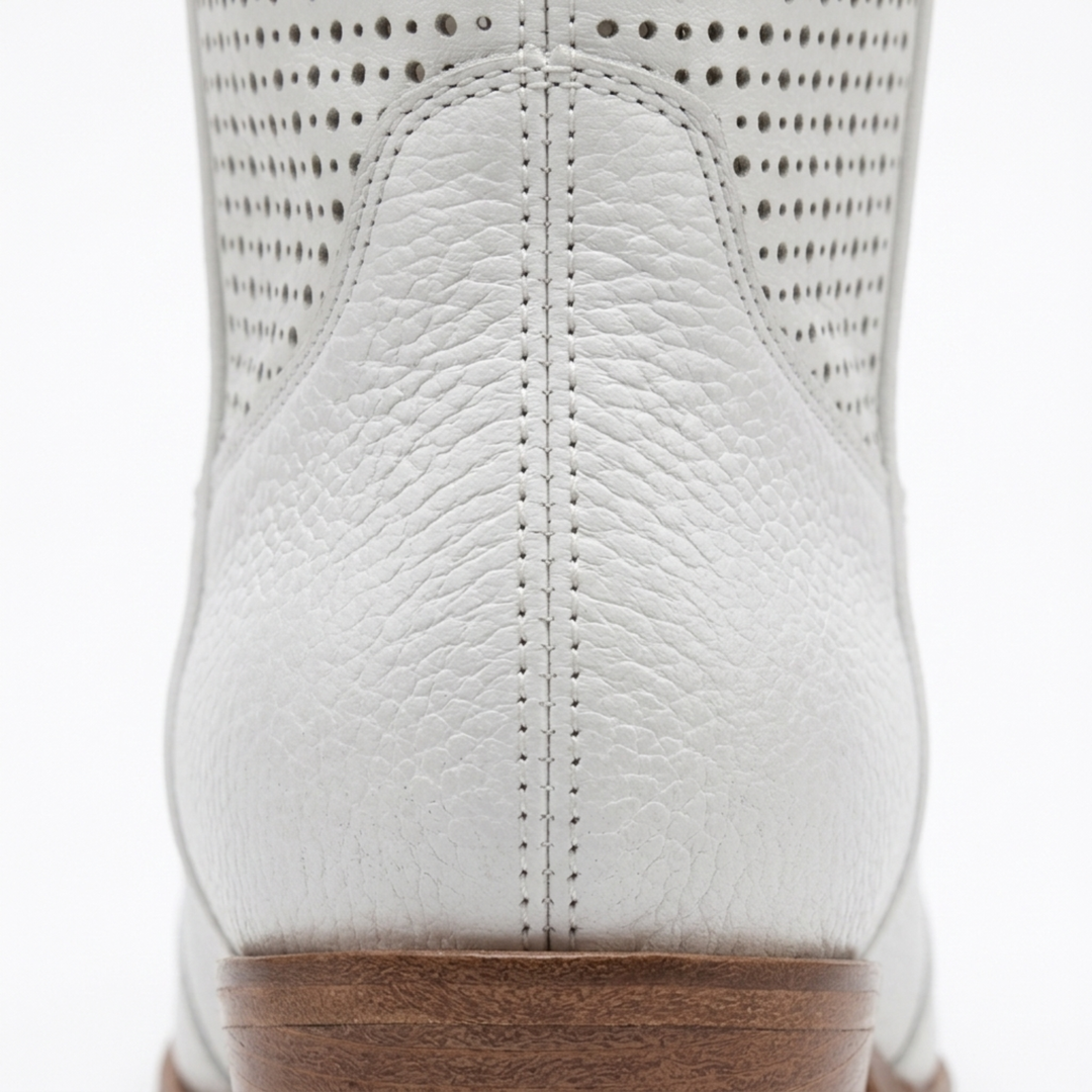 Pénélope | Bottines western chic en cuir perforé mi-mollet pour femme