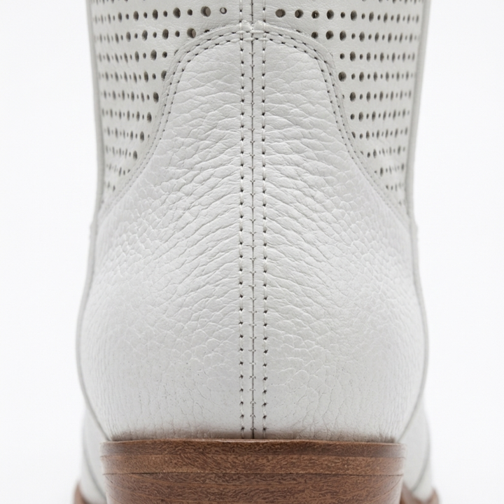Pénélope | Bottines western chic en cuir perforé mi-mollet pour femme