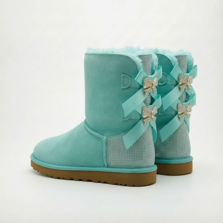 Aurore | Bottes chic en daim à nœuds pailletés et bordure en mouton pour femme