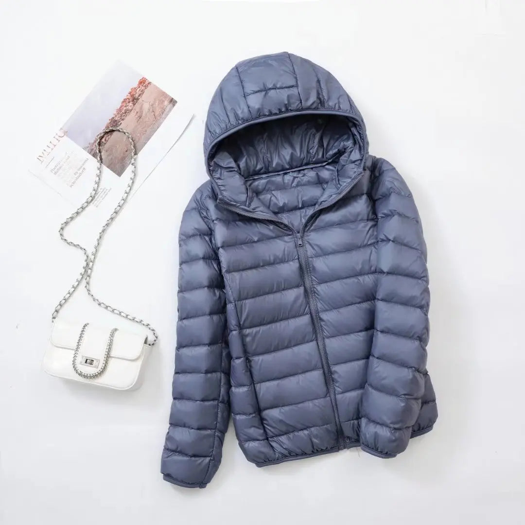 Flavia | Doudoune élégante légère réversible en duvet à capuche pour femme
