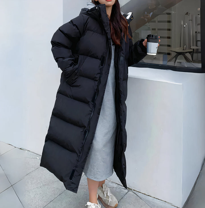 Doriane | Doudoune élégante longue à capuche pour femme